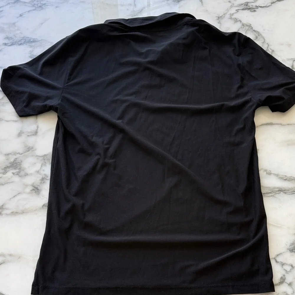 Vuori Black Short-Sleeve Performance Polo - Picture 4 of 5